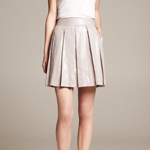 Shimmering silver pleated A-line skirt