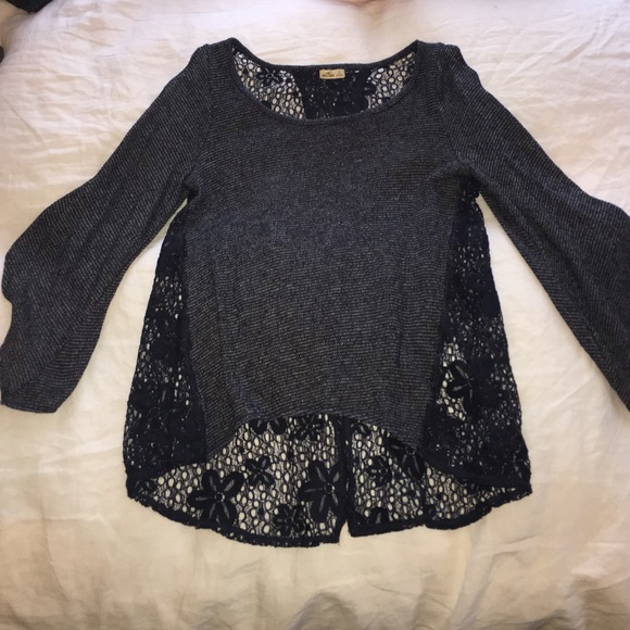 Navy, lace, slit-back top.