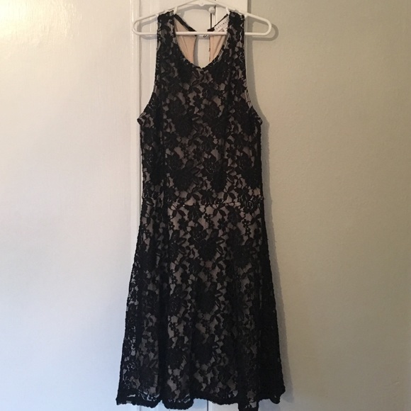 Cream and black lace dress.