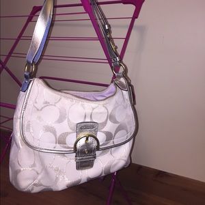 Beautiful off white with gold accents Coach purse!