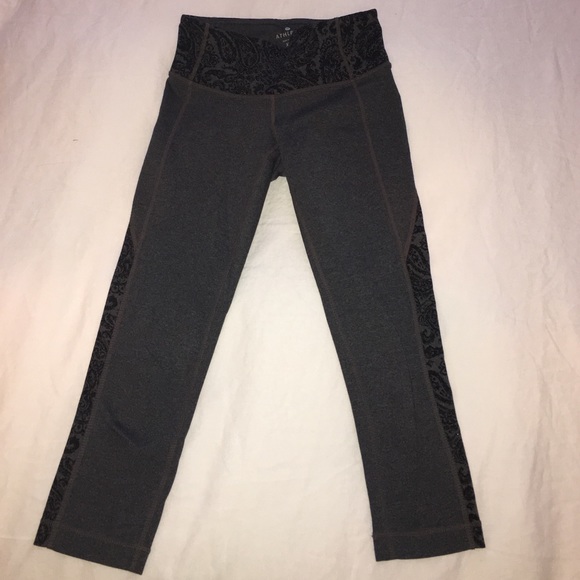 Gray Athleta Capri leggings, floral accents.