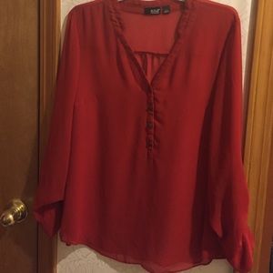 Sheer red half-button top