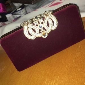 Dark red velvet clutch