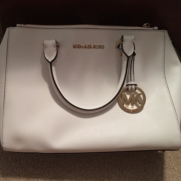 All white Michael Kors bag