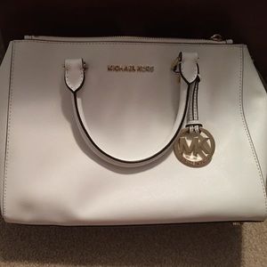 All white Michael Kors bag