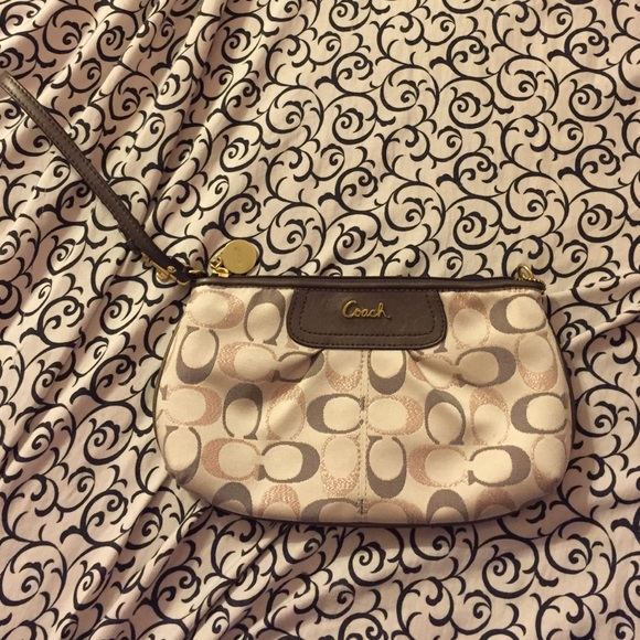 Beige coach wristlet