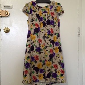 Floral silk dress with matching sash.