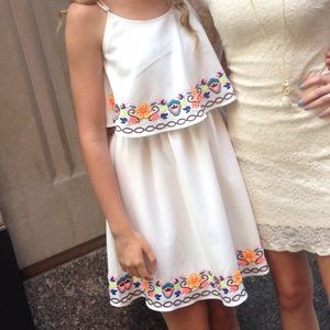 white dress w/ neon embroidery