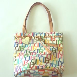 Small Dooney & Bourke cinch tote with tassels