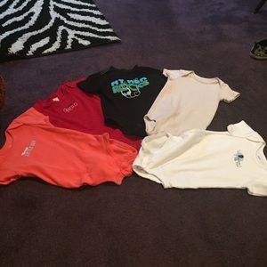Five 12 month Onesies