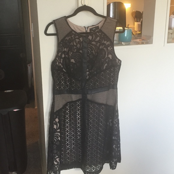 Black lace zip up sleeveless dress with nude slip