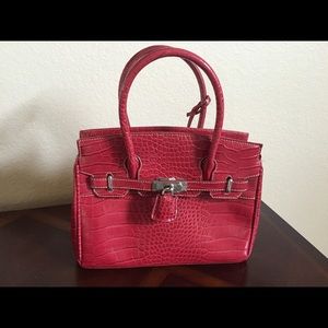 Cute red purse/tote snake skin style purse.
