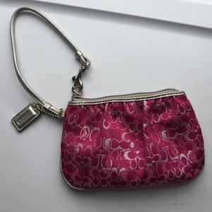 Pink and silver Coach Wristlet