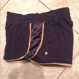 Black and gold Lululemon shorts
