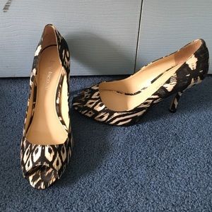 High heeled black and white shoes