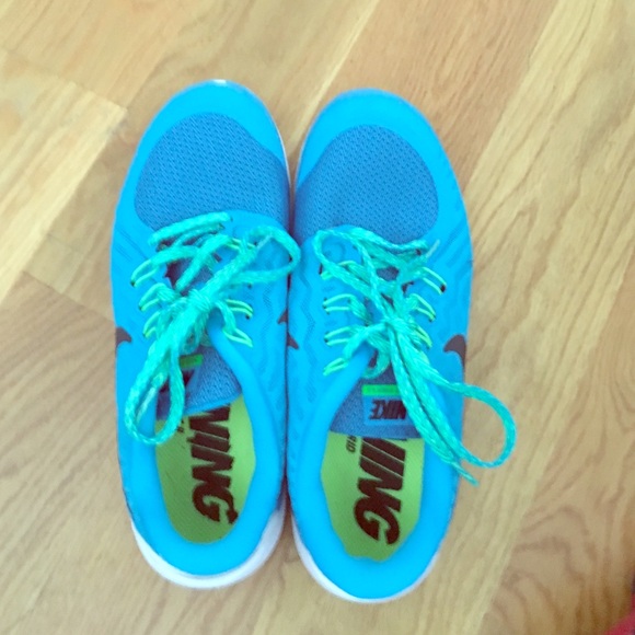 Slightly used blue and green Nike Free 5.0