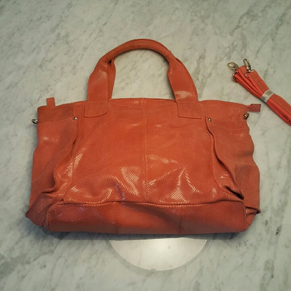 Unique salmon color leather handbag