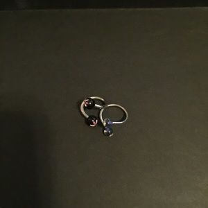 Two belly button rings