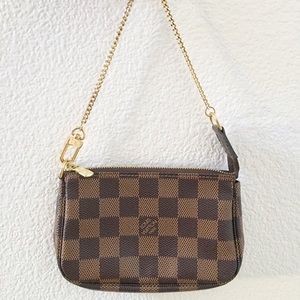 Louis Vuitton mini pochette. Like new.