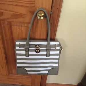 Gray and white purse