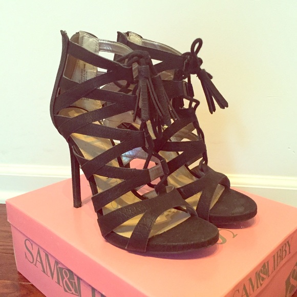 Black caged toe high heel sandals with tassel ties