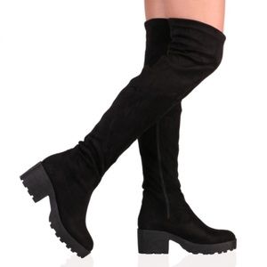 thigh high boots.