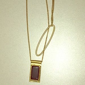 Made well gold necklace with black stone