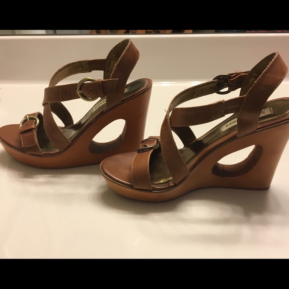 Steve Madden wedge cutout sandals.