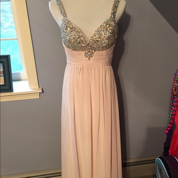 Blush pink floor length prom dress.