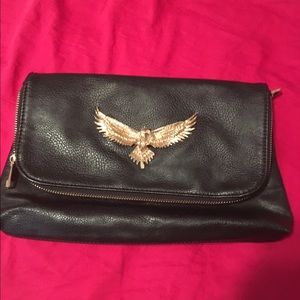 Black clutch with gold detail