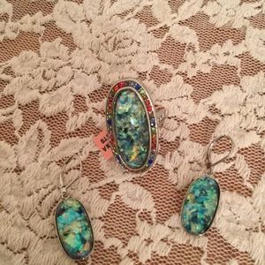 Green created opal ring and earrings