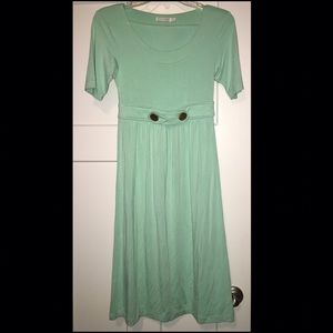 Seafoam green dress with gold buttons!