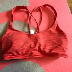 Cherry red Lululemon sports bra