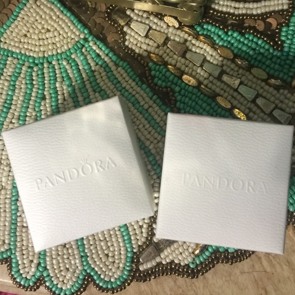 White pandora ring boxes.