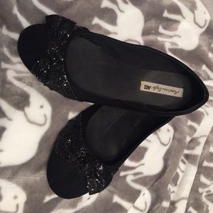 Black flats with sparkle bow