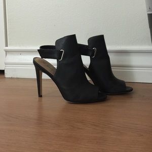 Peep toe ankle booties with cut out heel
