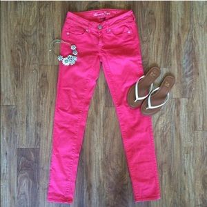 Bright pink American Eagle skinny stretch jeans