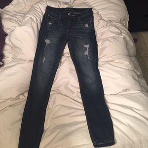 Express mid-rise distressed legging jeans