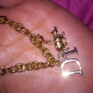 Diamond international charm bracelet