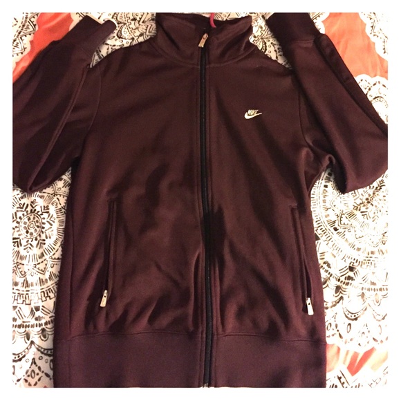 Nike jacket! It's a red purple color!