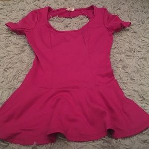 Pink form fitting shirt