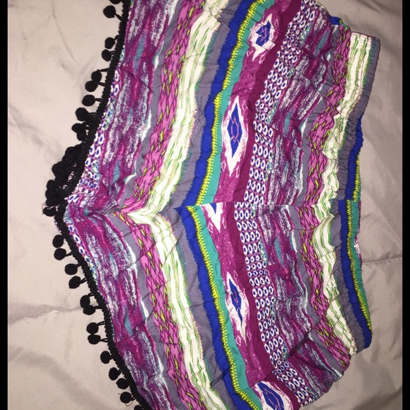 Copper key tribal print shorts with tassels