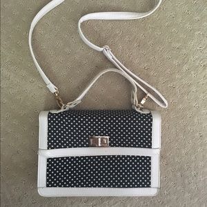 Navy and white polka dot purse
