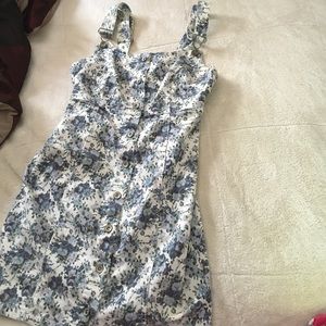 Denim floral dress size for and fits a size 8.
