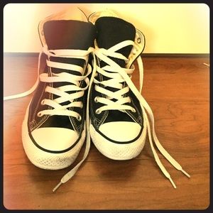 Black and white high top chucks