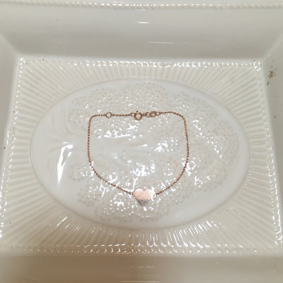Ruby Stella 14 k rose gold heart chain bracelet.