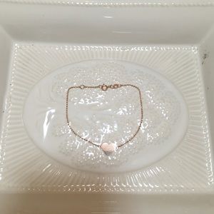 Ruby Stella 14 k rose gold heart chain bracelet.