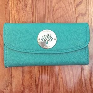 Mulberry, teal and green wallet.