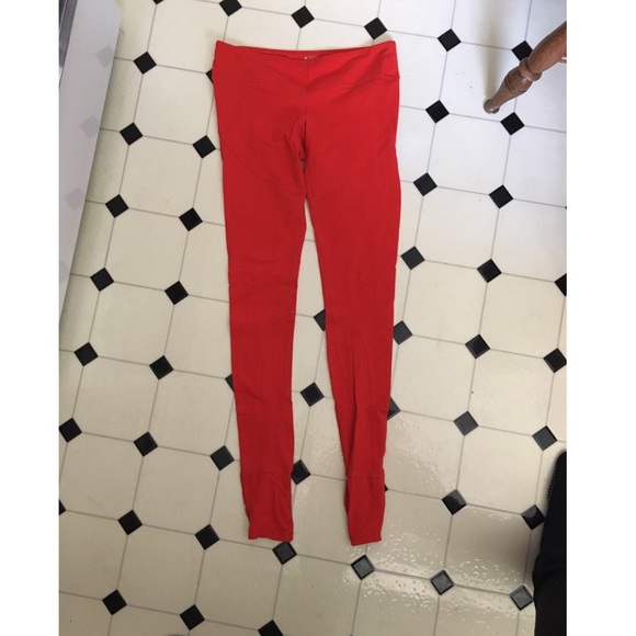 Red stirrup workout pants