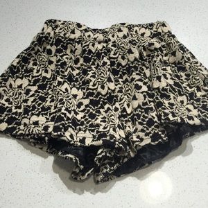 Brandy Melville beige and black mini skirt/shorts